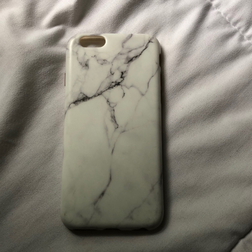 White/Black iPhone 6s marble phone case.